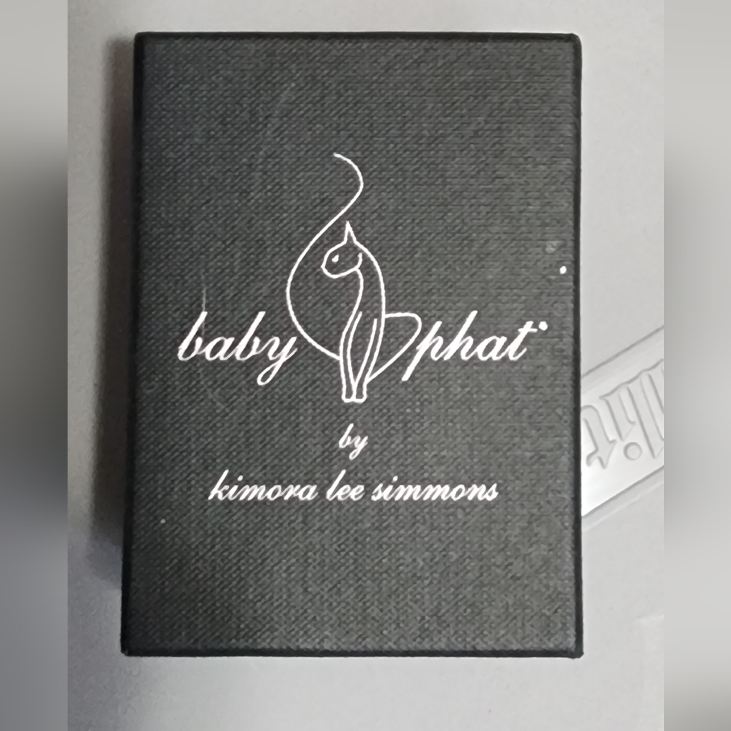 Black Baby Phat gift box printed with the Baby Phat cat logo and the words by Kimora Lee Simmons